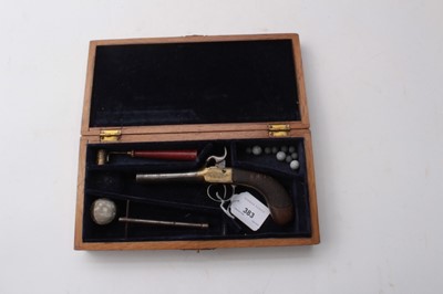 Lot 383 - Mid-19th century Percussion pocket pistol with brass box lock frame , turnoff steel barrel with Birmingham proofs, finel chequered walnut bag grip 18cm in fitted box with some accesories