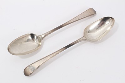 Lot 55 - Pair George III silver beaded Old English pattern tablespoons with engraved crest