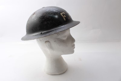 Lot 229 - Second World War British Military MKII Steel Helmet with black painted finish and white lettering to front- F.A.P. (First Aid Party) with chinstrap and liner.
