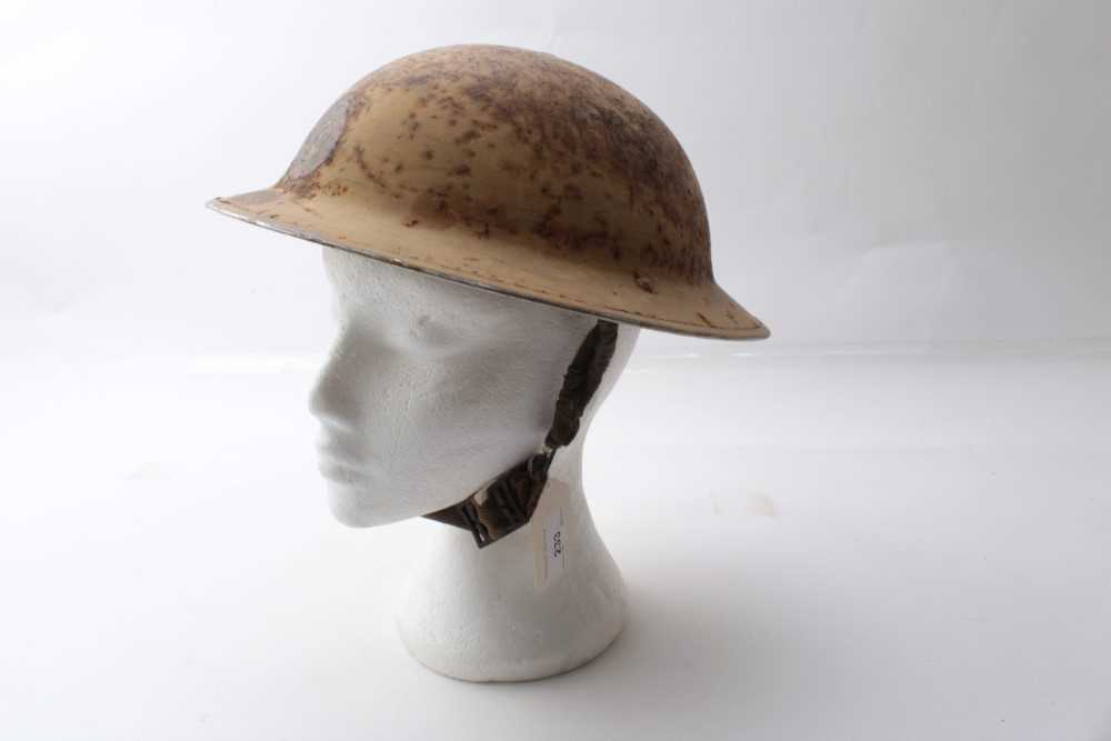 Lot 233 - Second World War British Military MKII Steel Helmet with painted finish and NFS (National Fire Service) badge to front, numbered 4 for Leeds and Yorks, with chinstrap and liner.