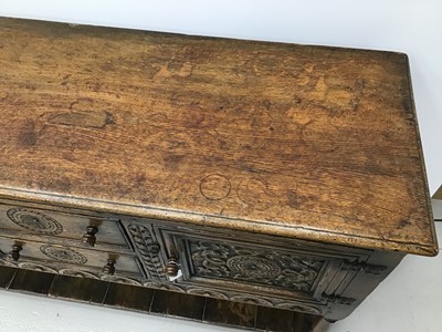 Lot 17 - Good quality 1920s Jacobean revival carved honey oak sideboard