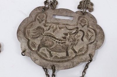 Lot 83 - Four Old Chinese white metal necklaces with embossed plaques depicting figures, dragons and flowers