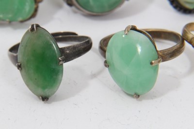 Lot 88 - Eleven Chinese green hardstone/jade rings