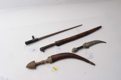 Lot 359 - Three Arab daggers and Russian spike bayonet (4)
