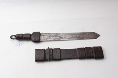Lot 363 - African short sword with tooled leather hilt and scabbard