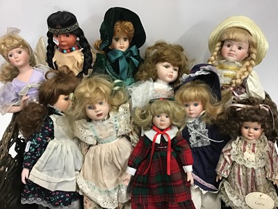 Lot 1575 - Assorted modern dolls in wicker basket