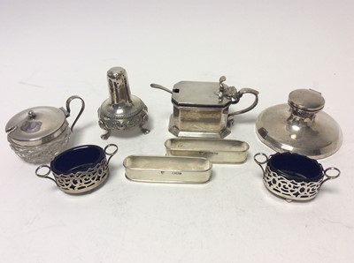 Lot 222 - George V silver mustard pot of octagonal form with reeded decoration, flared foot, hinged cover with blue glass liner to interior (Birmingham 1926), together with a George V silver