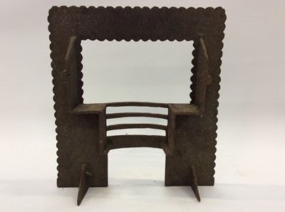 Lot 1895 - Three miniature Victorian ornamental cast iron fireplaces, a cast iron front plate, ash pan front and miniature front (6)