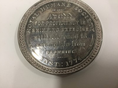 Lot 1988 - Royal Humane Society silver medal awarded for life saving, awarded to Arthur Dawson, inscribed Kelly Cottage, Tavistock 1916, 5cm diameter