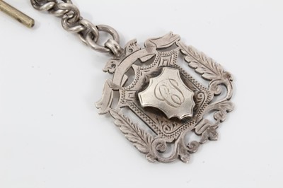 Lot 122 - Two silver watch chains both with silver fobs