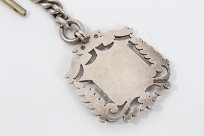 Lot 122 - Two silver watch chains both with silver fobs