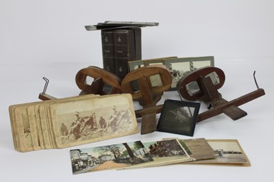 Lot 1906 - Three stereoscopic viewers, an Underwood & Underwood boxed set of Paris slides, and further slides including Boer War interest