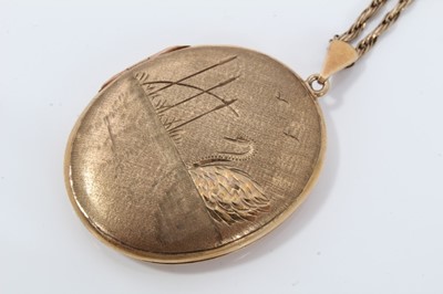 Lot 127 - 9ct gold oval locket with engraved swan decoration on chain