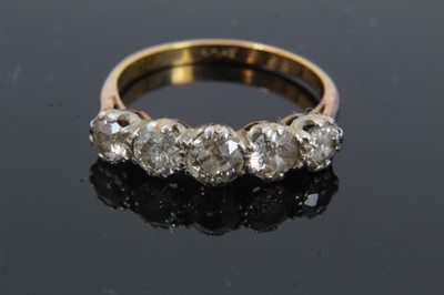 Lot 131 - 18ct gold diamond five stone ring in platinum setting