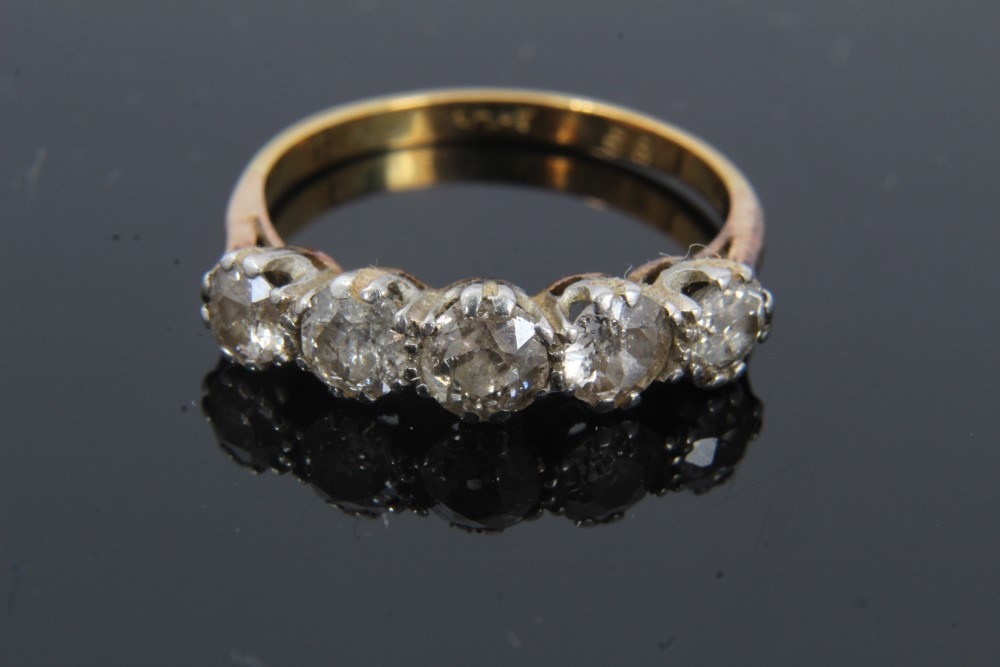 Lot 131 - 18ct gold diamond five stone ring in