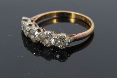 Lot 131 - 18ct gold diamond five stone ring in platinum setting