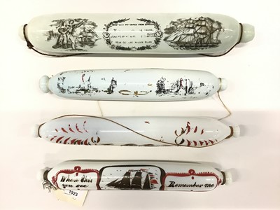 Lot 1923 - Four antique milk glass love token rolling pins with painted and printed decoration