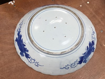 Lot 109 - Large Japanese Blue and white charger with prunus decoration