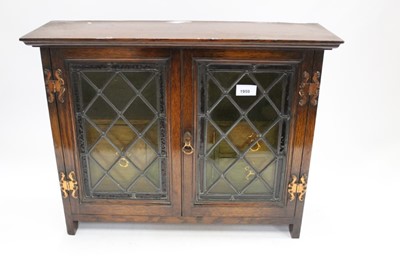 Lot 1959 - Edwardian oak smokers cabinet