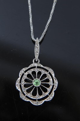 Lot 153 - Edwardian diamond and peridot pendant necklace