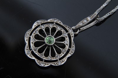 Lot 153 - Edwardian diamond and peridot pendant necklace