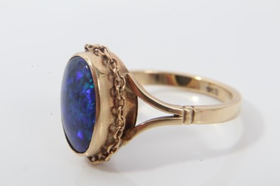 Lot 154 - 18ct gold tiger’s eye cocktail ring, 9ct gold opal ring and 9ct gold multi gem ring (3)