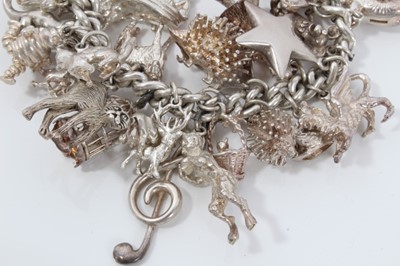 Lot 161 - Silver charm bracelet with padlock clasp