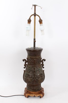 Lot 247 - Chinese bronze vase of archaic form, converted to a table lamp