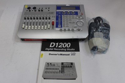 Lot 980 - Korg D1200 digital recording studio with owner's manual