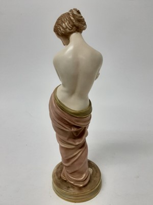 Lot 557 - Royal Worcester Blush Ivory figure - semi clad female