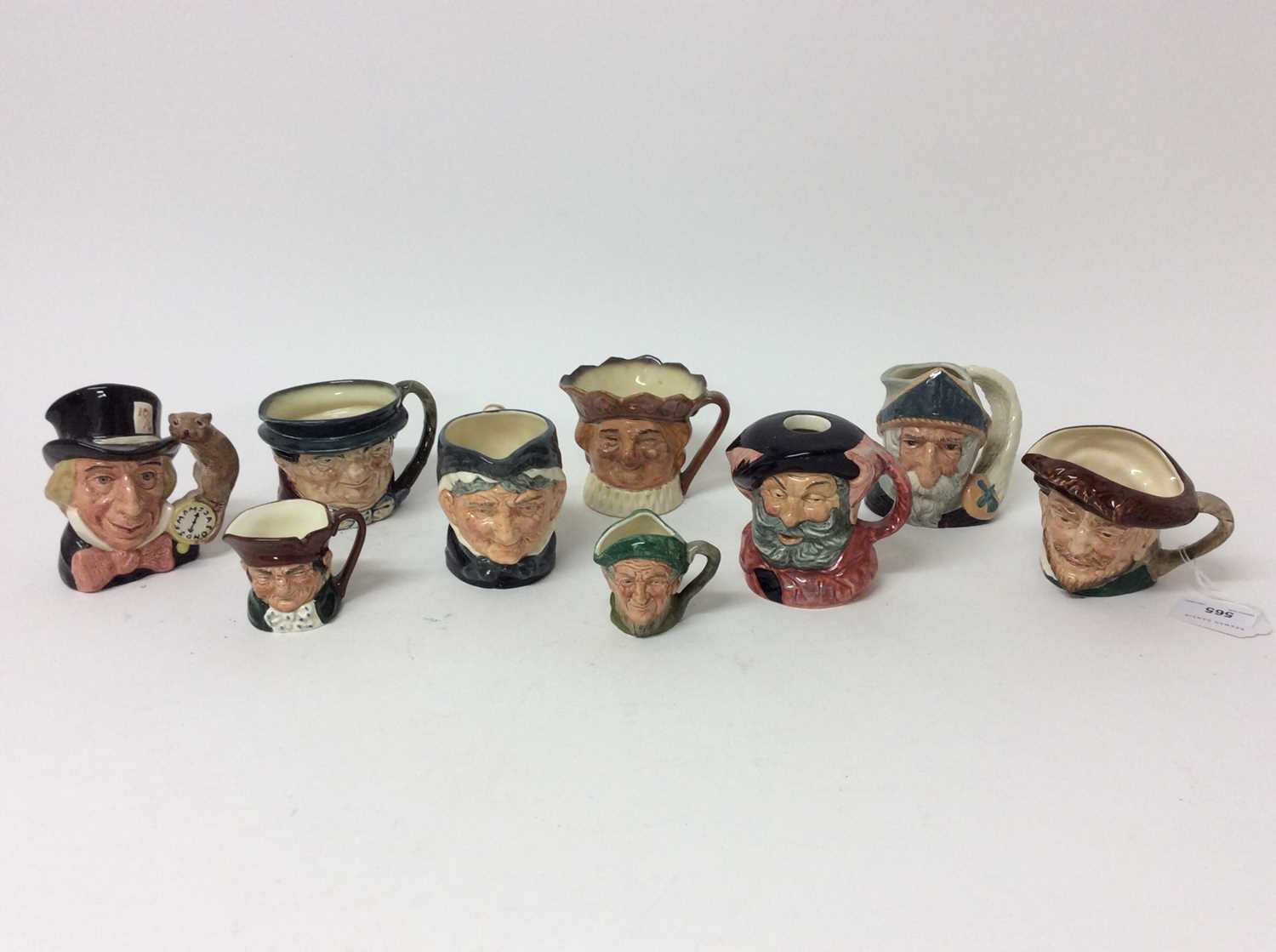 Lot 565 - Nine Royal Doulton character jugs - Drake, Tony Weller, Falstaff D6385, Mad Hatter D6602, Old King Cole, Granny D6384, Don Quixote D6460, Auld Mac D6253 and Old Charley D6046
