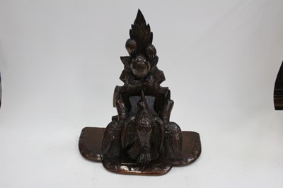 Lot 2012 - Impressive Black Forest Style carved oak wall bracket with carved decoration depicting birds and fruit, approximately 52cm in overall length