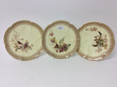 Lot 631 - Three Royal Worcester blush ivory dishes decorated with insects and flowers, 22cm diameter