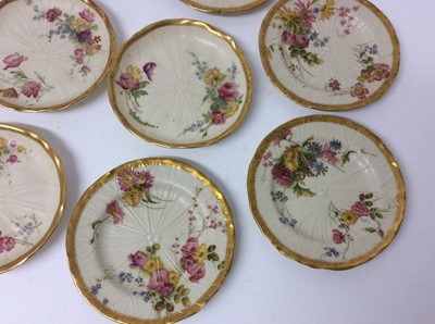 Lot 632 - Eleven Royal Worcester blush ivory moulded dishes, decorated with flowers, 14cm diameter