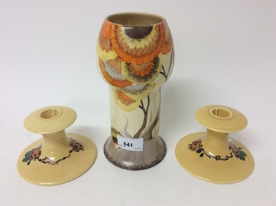 Lot 641 - Clarice Cliff vase decorated in the Rhodanthe pattern, 20.5cm high and a pair of Clarice Cliff candlesticks
