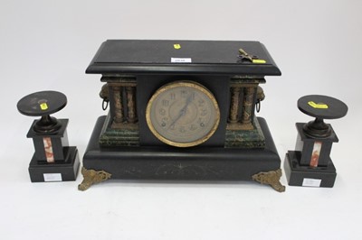 Lot 2030 - Ebonised wood mantel clock and garniture