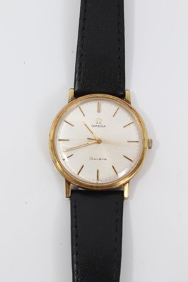 Lot 178 - 1970s gentlemens Omega Genève wristwatch with 17 jewel 601 calibre movement, the circular brushed satin dial with applied gold dart hour markers and centre seconds, in gold plated circular case, on...