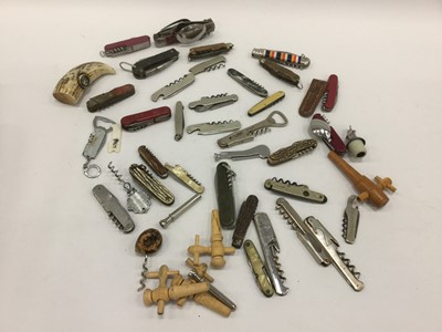 Lot 2017 - Extensive collection of old corkscrews, bottle openers, penknives and related items