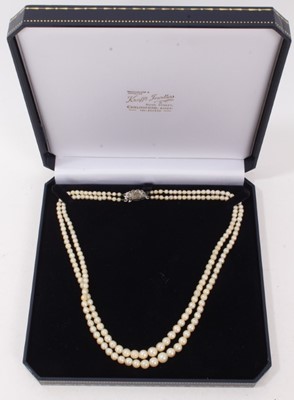 Lot 180 - 1930s cultured pearl two strand necklace with marcasite clasp