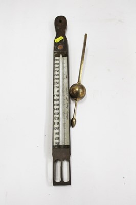 Lot 2039 - Hydrometer / Thermometer by W. Harvey & Sons Ltd, together with an Oak Mounted Thermometer by Joseph Long Ltd, London (2)