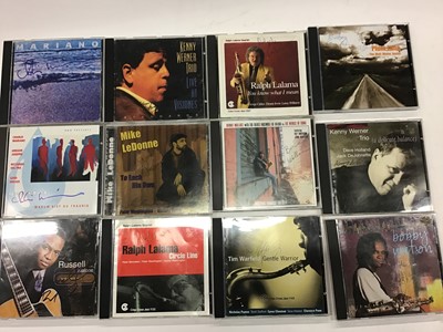Lot 734 - Box of signed Jazz CDs including The New Couriers, Dianne Reeves, Larry Coryell, David Newton, Bobby Watson, Tim Warfield Sextet and Barbara Thompson (approx 130)