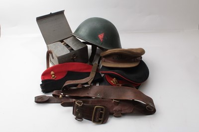 Lot 267 - Group of Second World War and later British military Royal Artillery officers caps, side cap, helmet, and Sam Browne belt all from Robert L. Harding (some pieces named)