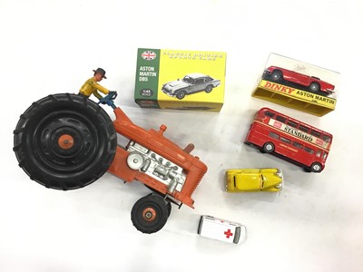 Lot 1531 - Diecast Dinky Aston Martin DBS No.110 boxed, Atlas edition Aston Martin 1:43 scale, boxed, plus 3 other unboxed models and a Tricky Tommy Tractor (battery operated) also unboxed.