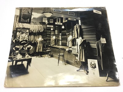 Lot 1274 - Two Large Edwardian aPhotographs, one interior of Gentlemen's Outfitters, Batterby's Hats mirror and one exterior of Outfitters.