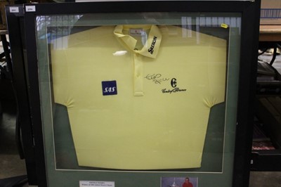 Lot 2054 - Thomas Bjorn Winner of the 2001 Dubai Desert Classic signed Golf shirt, mounted in a glazed frame, 89 x 89cm