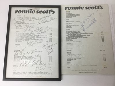 Lot 782 - Framed A4 Ronnie Scott’s menu dated March 1984, signed by various jazz musicians together with another signed by Ronnie Scott and seven signatures to reverse