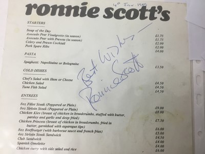 Lot 782 - Framed A4 Ronnie Scott’s menu dated March 1984, signed by various jazz musicians together with another signed by Ronnie Scott and seven signatures to reverse