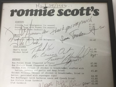 Lot 782 - Framed A4 Ronnie Scott’s menu dated March 1984, signed by various jazz musicians together with another signed by Ronnie Scott and seven signatures to reverse