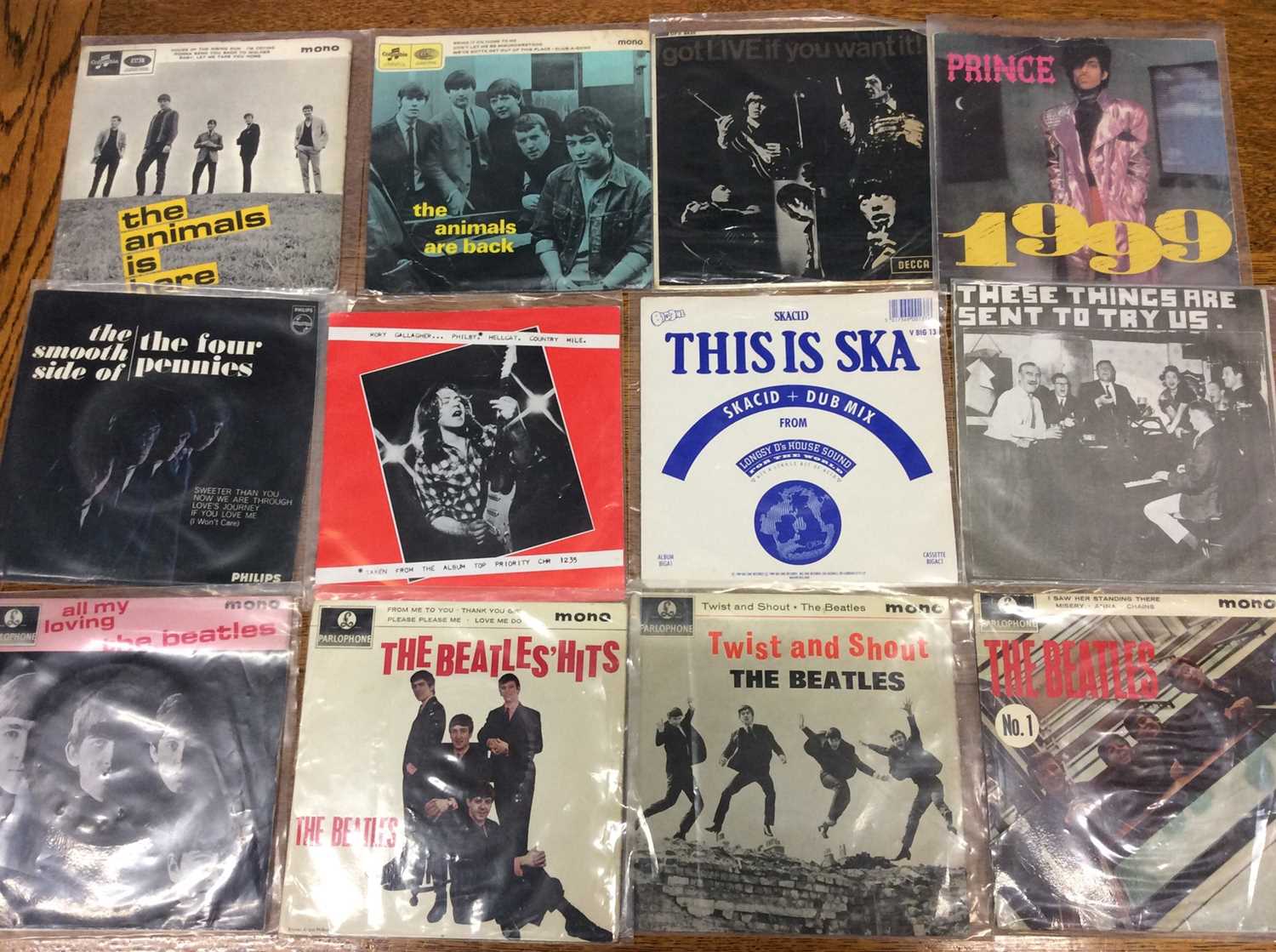 Lot 972 - Box 45s and EPs including The Beatles and