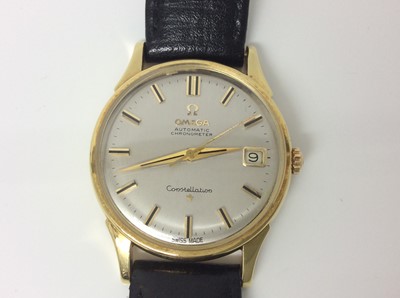 Lot 407 - 1960s gentlemens Omega 18ct gold Constellation wristwatch on omega black leather strap